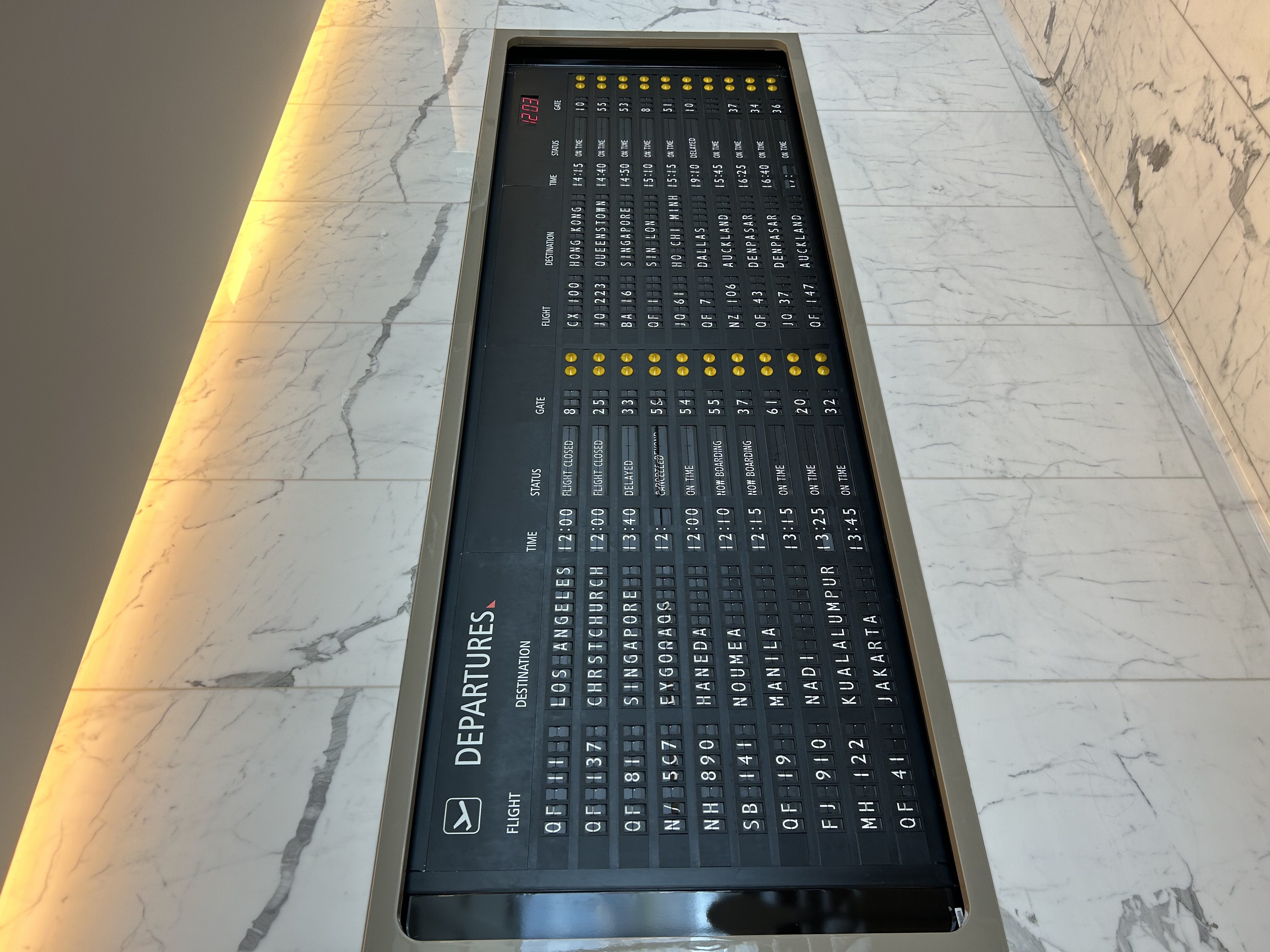 Departures Board from Qantas First Lounge at Sydney Airport